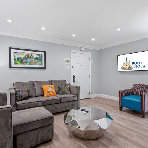 Casual living area w/ comfy seating & a bright, open layout.