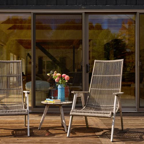 Just outside the main house living room is the perfect place to take in the private sanctuary around you.