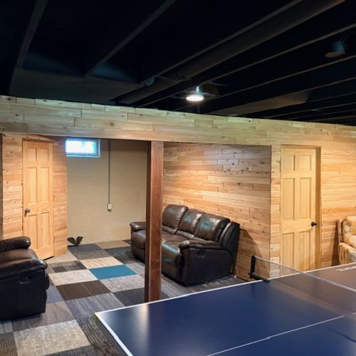 BASEMENT:  The fun ping pong table in the partially finished.