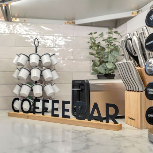 Brew your morning cup at the coffee bar w/ a mug tree & toaster ready to go