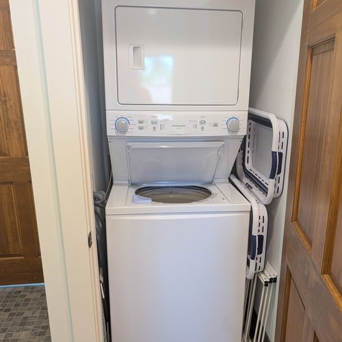 LAUNDRY ROOM (THIRD FLOOR):  The home has a convenient laundry closet wtih a stacked washer and dryer.  It is within the bathroom on the third floor.