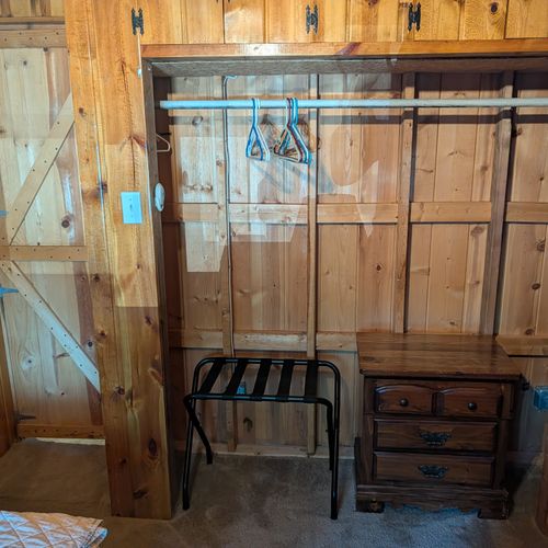 BEDROOM #2:  Features 2 twin size beds, nightstand, lamp, closet, dresser, and luggage stand