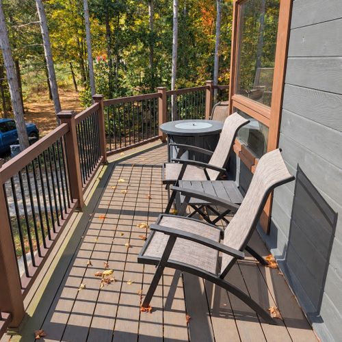 EXTERIOR:  The front deck, which features a propane fire table.