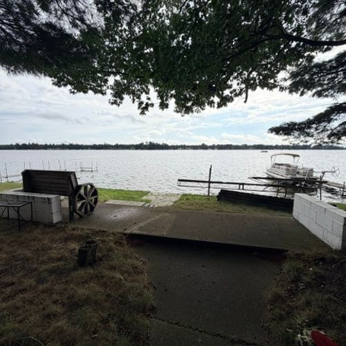 EXTERIOR:  The backyard, highlighting the Van Etten lakefront