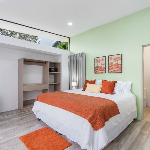 Bedroom with closet and safe