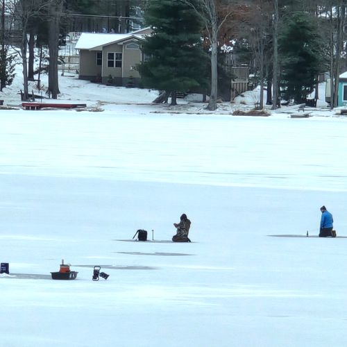 EXTERIOR:  Bass Lake in the winter, with ice fishing!