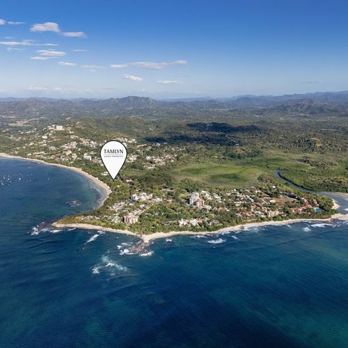 Beachfront property on the sandy beach of Tamarindo Bay