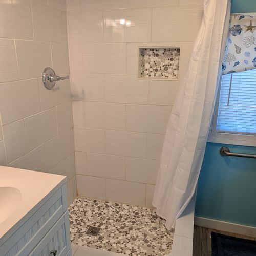 BATHROOM:  The cabin has a very cute and recently-updated full bathroom