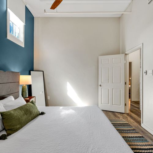 Sun-kissed bedroom with a sage green accent