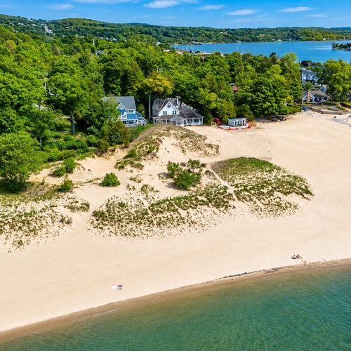 OVERVIEW:  Another aerial photo showing Lake Michigan, Frankfort Beach, the house, and Betsie Bay in the background