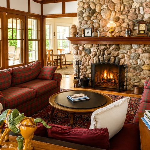 LIVING ROOM:  The home has a huge and very comfy and family-friendly living room with a large wood fireplace.