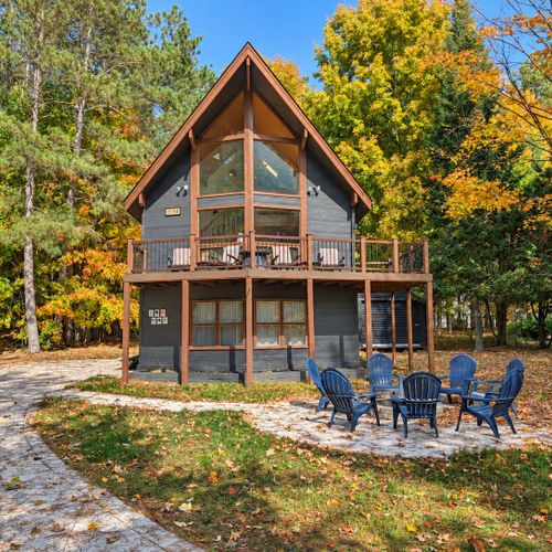 EXTERIOR:  The front of the chalet in the Fall.