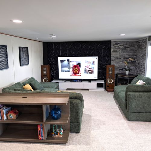 RECREATION ROOM (LOWER LEVEL):  The home has a very cute and fun recreation room in the lower level that is complete with a wet bar and mini-frig.