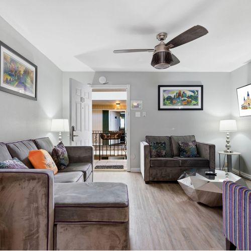 Unit 307 – Bright living space w/ comfy seating & a smart TV to unwind.