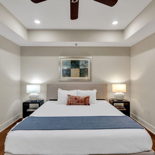 Serene bedroom with crisp linens and warm accents