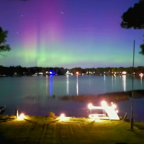 OVERVIEW:  Looking at the northern lights from the backyard at night