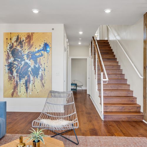 Bold abstract art greets you at the stairs