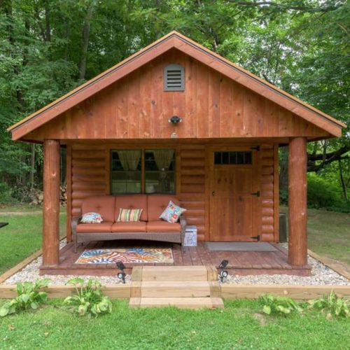 CABIN #2:  Cute little woodsy log cabin with 2 queen-size beds.  Mini-split unit included for heat and A/C.