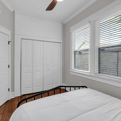 Spacious closet & a sunny window w/ blinds for easy privacy & restful mornings