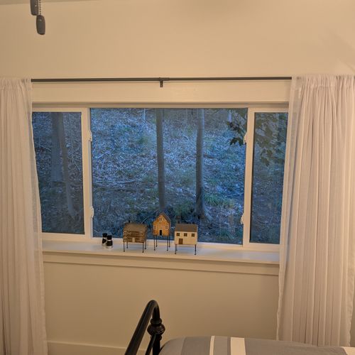 BEDROOM #1 (SECOND FLOOR):  Features a queen-size bed, nightstands, lamps, dresser, mirror, closet, and ceiling fan.