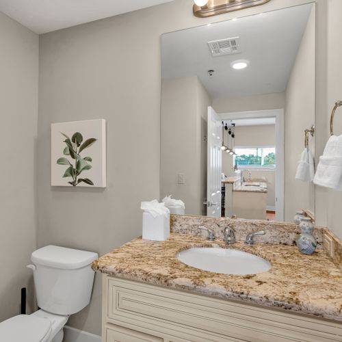 Fresh vanity with botanical wall art