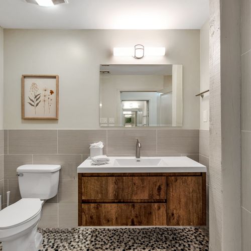 Warm wood vanity with clean modern lines