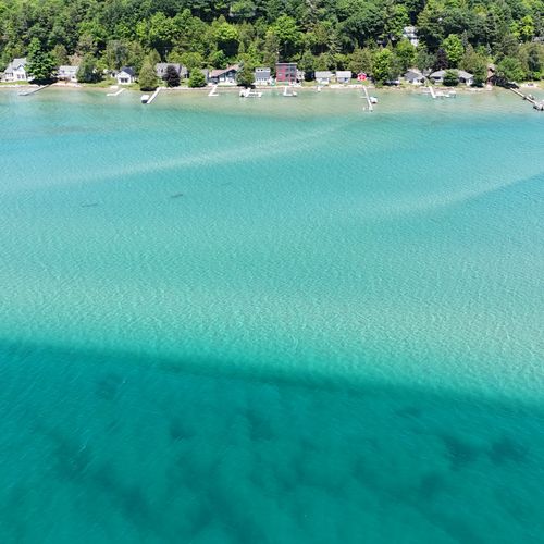 EXTERIOR:  Another aerial photo showing Eagles Landing and the gorgeous colors of Crystal Lake.