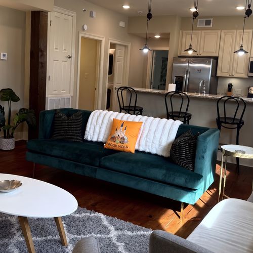 Cozy lounge w/ plush sofa & natural light