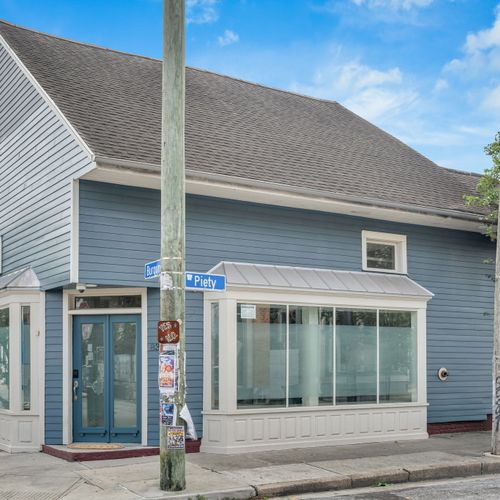 Corner home with picture windows and curb appeal
