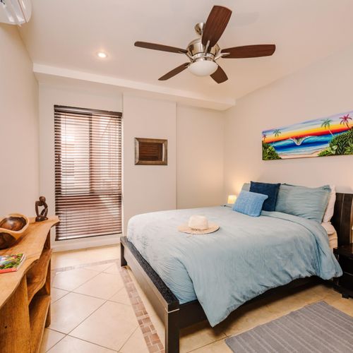 Bedroom three with queen bed