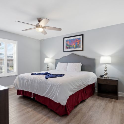 Unit 301 – King bed retreat w/ warm tones for a restful night's sleep.