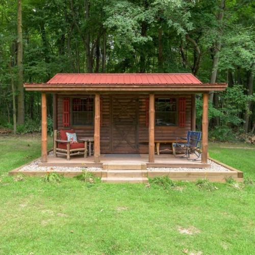 CABIN #1:  Cute little woodsy log cabin with a queen-size bed.  Mini-split unit included for heat and A/C.