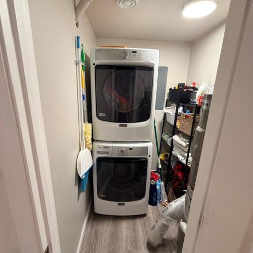 LAUNDRY ROOM:  Super convenient laundry room with a stacked washer and dryer.