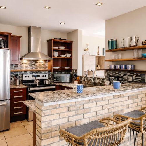 Breakfast bar opens to dining room