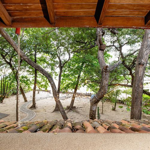 Walk directly from the house out to the beach
