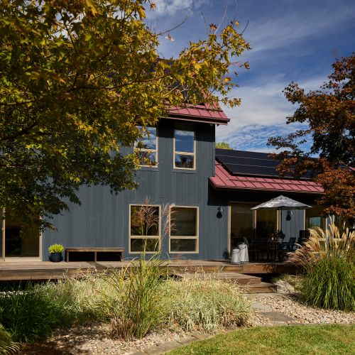 Exterior deck on the main house, with outdoor dining.