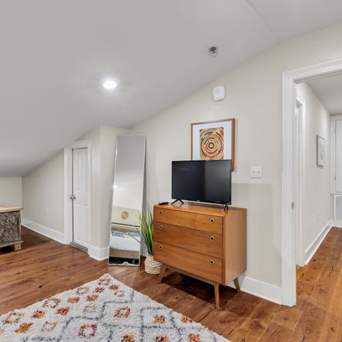 Full-length mirror and TV for getting ready
