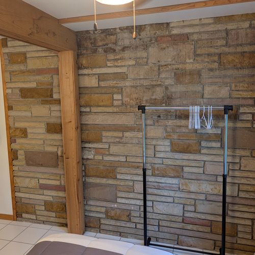 BEDROOM #4 (SECOND FLOOR):  Features 2 twin size beds, a dresser, mirror, nightstand, lamp, ceiling fan, and a clothes rack.