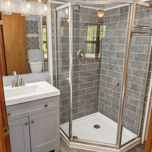 BATHROOM #2 (FIRST FLOOR):  Full bathroom on the first floor with a walk-in shower.