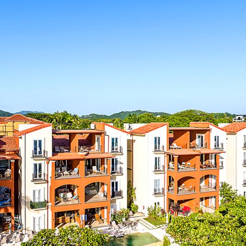 Aerial view of the Horizontes Del Mar condominium building in Playa Langosta, Tamarindo, Costa Rica.