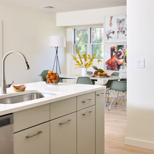 As you enter the guest house, you'll find the property's second full kitchen to your right, with dining area beyond.