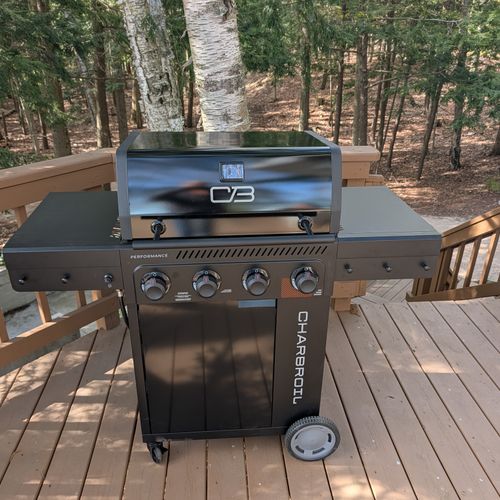 EXTERIOR:  The new propane grill that is on the deck