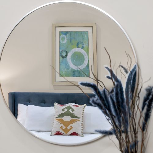 Plush king with a tufted navy headboard
