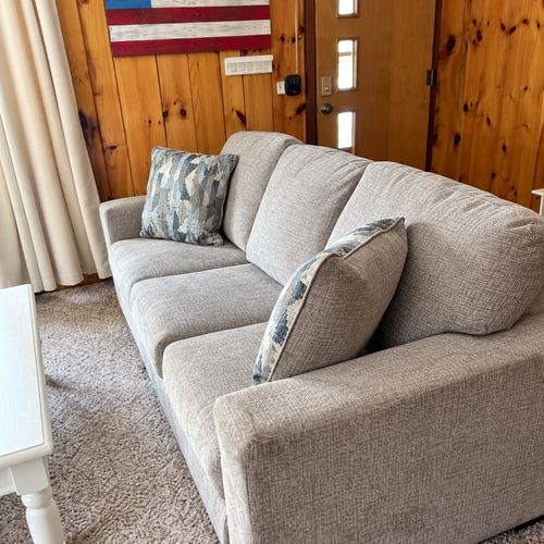 OVERVIEW:  The home has a comfy and relaxing living room with a sofa, chair coffee table, and television.  (Note that the wood fireplace in the living room is not available for guest usage.)