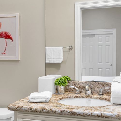 Granite vanity with a splash of red art