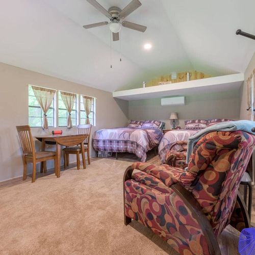 CABIN #2:  Cute little woodsy log cabin with 2 queen-size beds.  Mini-split unit included for heat and A/C.