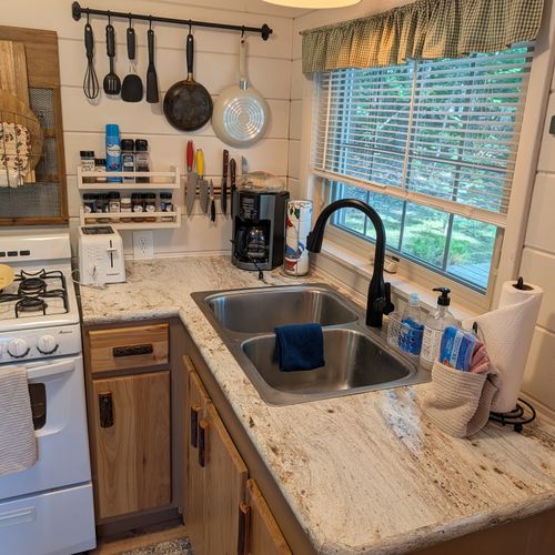 KITCHEN:  The home has a full kitchen with all appliances except a dishwasher.  Note that there is a breakfast table as well.