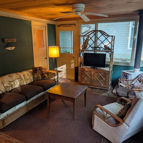 SECONDARY LIVING ROOM (MAIN FLOOR):  There is also a second living room on the main floor just inside the front door.