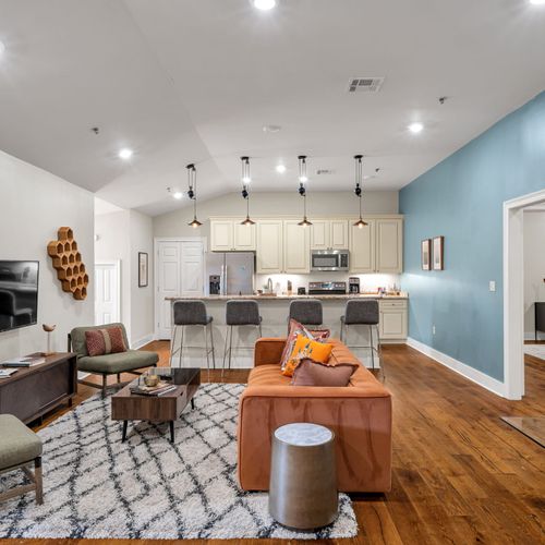 Open living with bold color and wine on display
