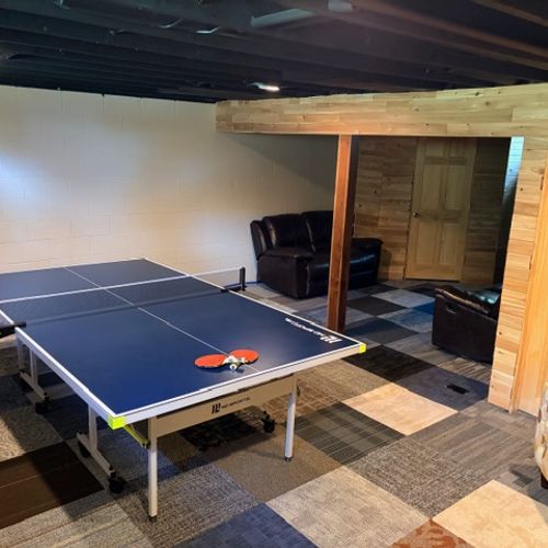 BASEMENT:  The fun ping pong table in the partially finished.